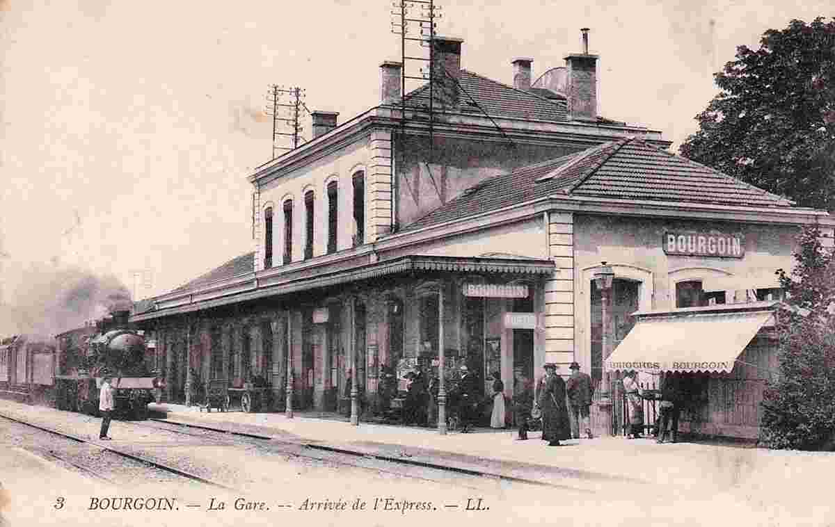 Bourgoin-Jallieu. Bourgoin - La Gare, plateforme, Arrivée de l'Express