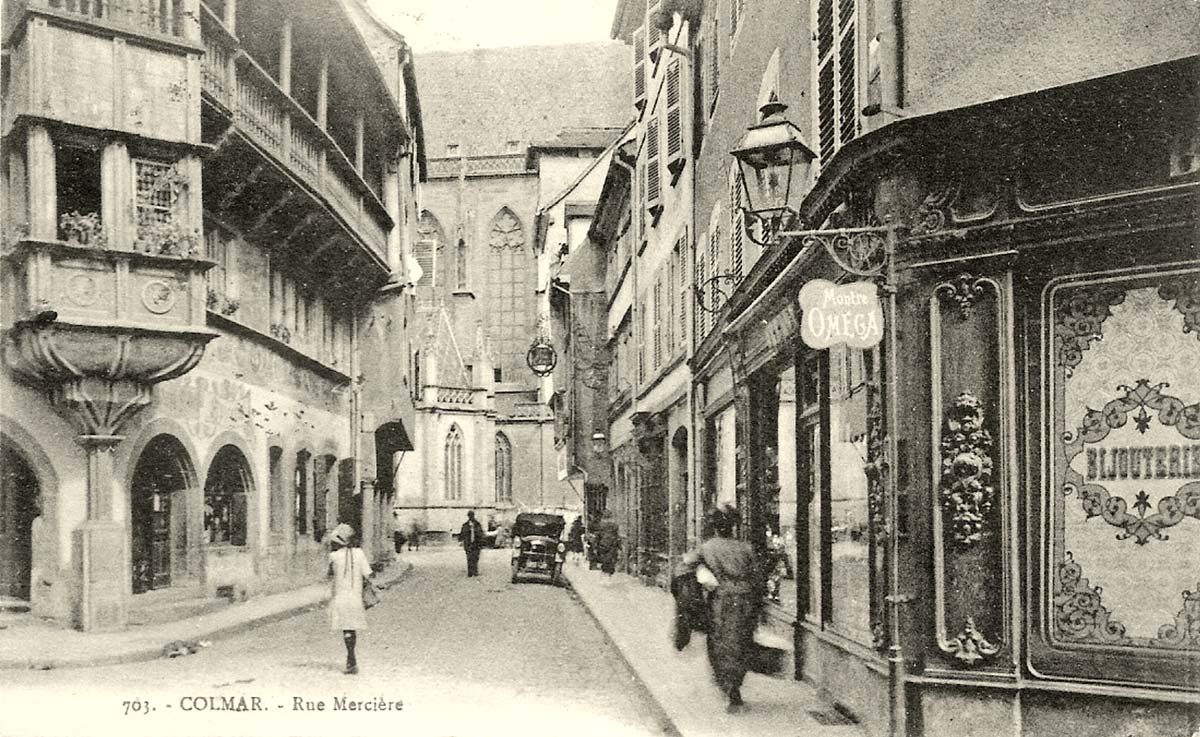 Colmar. Rue Merciere, commerces et l'Église, 1929